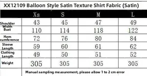 Size chart for purple satin shirt showing shoulder, chest, and length measurements