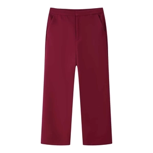 Detailed view of burgundy straight-leg trousers featuring a front zipper and side pockets
