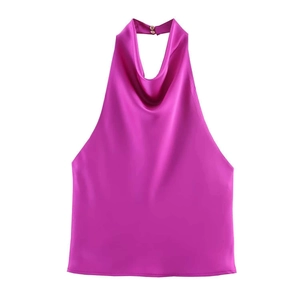 Detail of rose red satin halter top featuring a draped neckline and silky texture