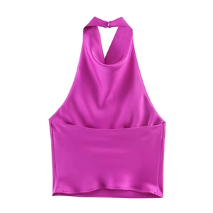Detail of silk-satin halter top back in vibrant magenta with smooth glossy texture