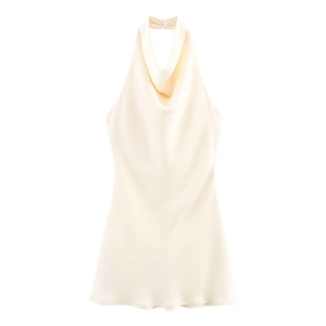 Detail of ivory satin halter top with elegant cowl neck and refined back tie closure