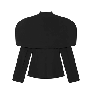 Detail of black cape blazer with stand collar and elegant layered silhouette