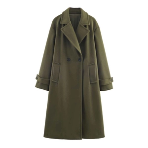 Detail view of olive green double-breasted wool coat with lapel collar and flap pockets