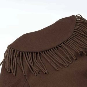 Close-up of brown wool coat collar featuring detailed long fringe trim and fabric texture