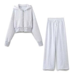 Three-piece light grey tracksuit set with cropped zip hoodie and wide-leg jogger pants