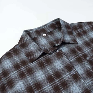 Classic blue and brown plaid long sleeve shirt with turndown collar and button detail