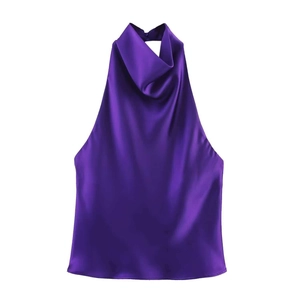 Detail of elegant dark purple satin halter neck top with smooth silk texture and draped collar