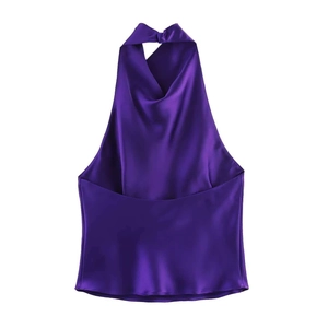 Detail of elegant dark purple satin halter top with glossy finish and neck tie detail