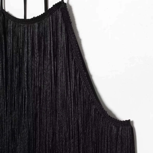 Minimalist black pleated halter neck top with textured vertical fringes and silky finish