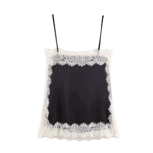 Close-up of black satin camisole top with delicate white lace trim and thin straps
