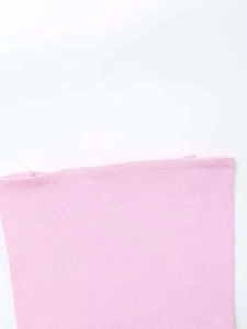 Detail shot of light pink ribbed knit fabric showing soft texture and premium elasticity