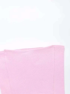 Close-up of pink knitted ribbed fabric texture showing soft vertical stripe details