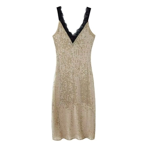 Sparkly gold sequin mini dress with black lace V-neckline for party and evening wear