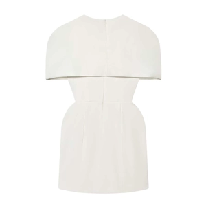Detail view of white cape-style mini dress with high waist and hollow-out design