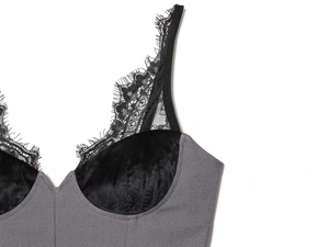 Detailed close-up of the delicate black eyelash lace trim on a grey slim fit camisole