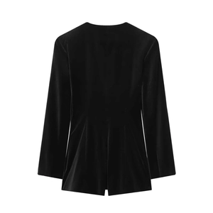 Back view of a sleek black velvet long-sleeve jumpsuit with a cinched waist and peplum hem