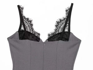 Detail of grey dress showing fine black eyelash lace trim and invisible zipper on the back