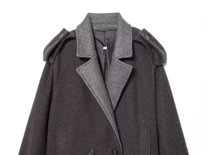 Detail view of dark grey wool coat featuring contrast light grey collar and S size label