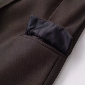 Deep coffee slim fit blazer for women showing close-up of pocket detail and premium lining