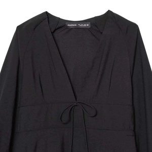 Elegant black V-neck long-sleeve dress with waist tie and minimalist branding label