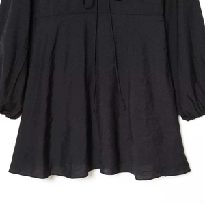 Elegant black V-neck dress with lantern sleeves and a flattering drawstring waist tie