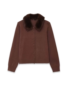 Detail of the brown knit cardigan showing the plush faux fur collar and button closure