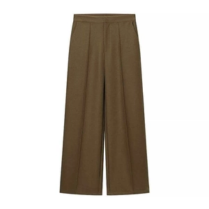 Women's high waist wide leg trousers in deep olive brown with pressed creases and pockets