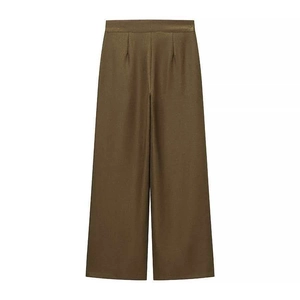 Detail view of high-waist wide-leg trousers with front pleats in dark olive woven fabric