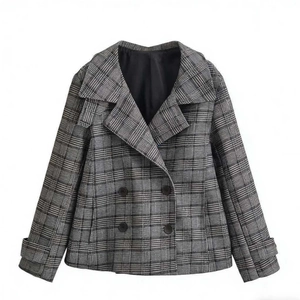 Classic black and white plaid double-breasted blazer with notched lapels and cuff straps