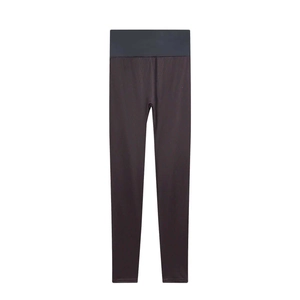 Detail view of high-waisted dark coffee slimming leggings with tummy control compression