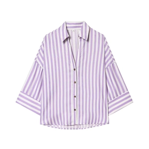 Detail view of the collar and size label on a striped V-neck shirt with purple stripes