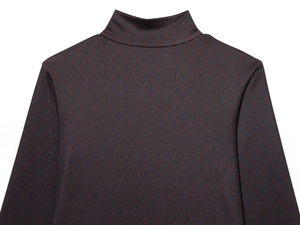 Detail of high neck knit sweater featuring premium diamond geometric texture in dark brown