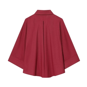 Back view of loose dark red striped shirt featuring a lapel collar and pleated hem details