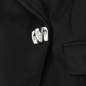 Classic black short blazer featuring a unique irregular silver metallic button detail