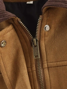 Detail of faux suede jacket with dark brown corduroy collar and metal zip closure