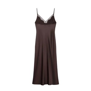 Detail of silk-satin dress showing V-neck black lace trim and thin shoulder straps