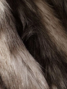 Macro shot of faux fur texture with gradient brown and grey fibers for a premium look