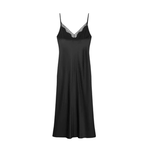 Detailed close-up of V-neckline with delicate black lace trim on satin slip dress