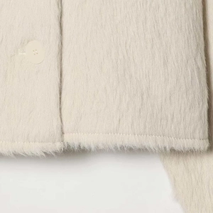 Women's off-white faux fur plush jacket with button detail and long sleeves