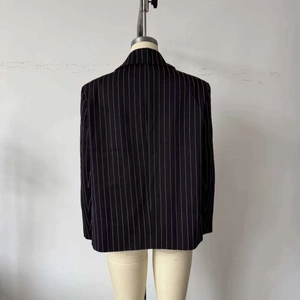 Classic black and white pinstripe blazer for women featuring a minimalist H-line silhouette