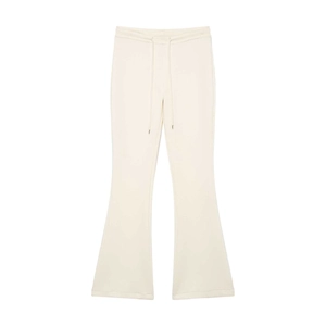 Detail of high waist cream drawstring trousers showing adjustable metal tips and fabric texture