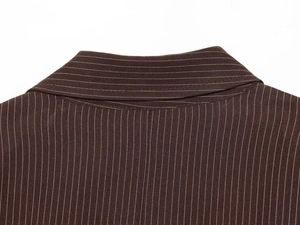 Detail of brown twill blazer with white pinstripes and neat stitching on the back collar