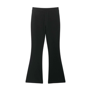 Close-up of adjustable drawstring waist on black high-waisted flared trousers