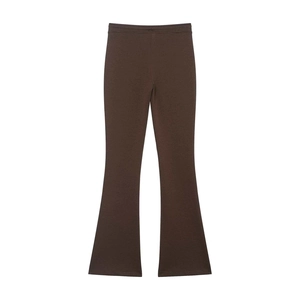 Detailed close-up of dark brown high-waisted flared knit pants with elastic waistband