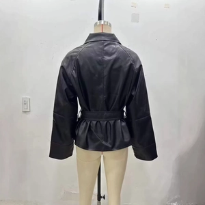 Chic black faux leather cropped jacket with belted waist and long sleeves for women