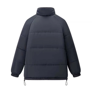 Women's charcoal gray oversized quilted jacket with high stand collar and drawstring hem