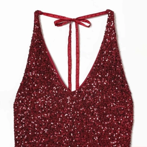 Elegant deep red sequin halter maxi dress with satin bow tie back and V-neckline