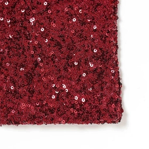 Elegant wine red sequin halter maxi dress with shimmering fabric and detailed embroidery