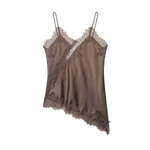Detail of coffee satin camisole showing delicate lace trim and asymmetrical hem design