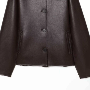 Dark brown leather jacket featuring textured grain finish and plush collar trim detail